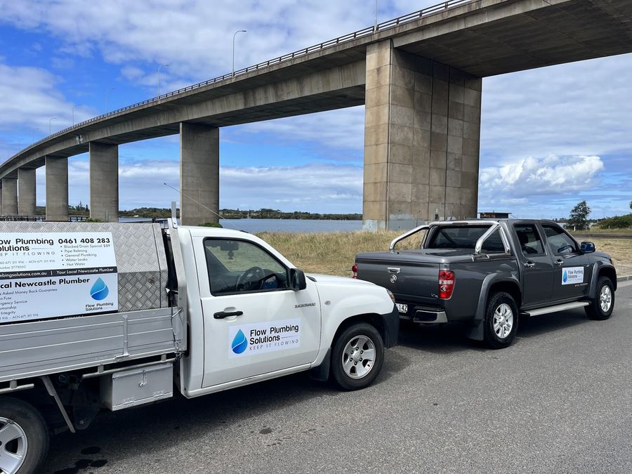 Flow Plumbing Solutions utes near the Stockton Bridge, Newcastle